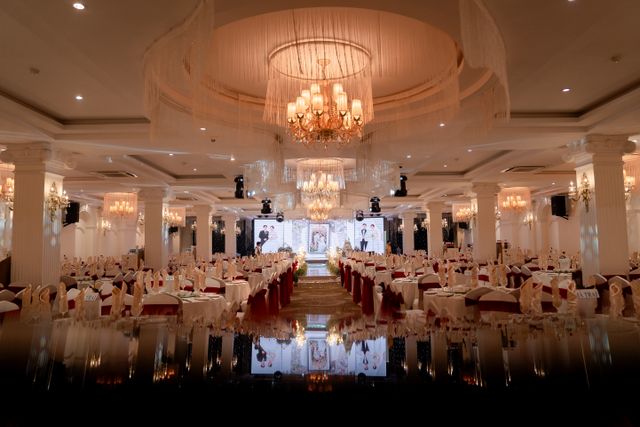 Wedding ceremony aisle under a floral mandap
